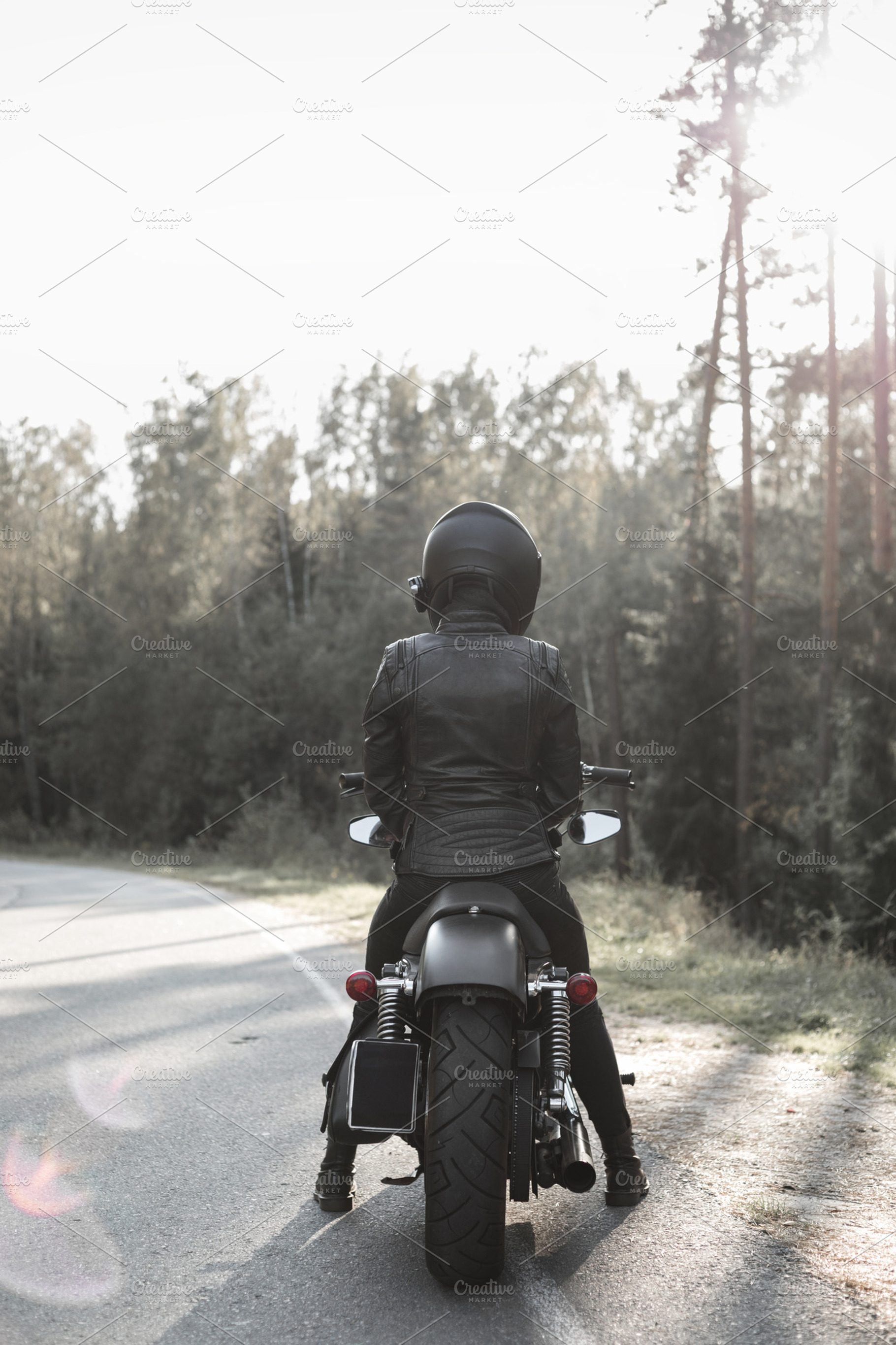 Sexy girl biker and cafe racer motorcycle featuring wheels, motorcyclist, and, a Transportation Photo by Aliaksei Kaponia