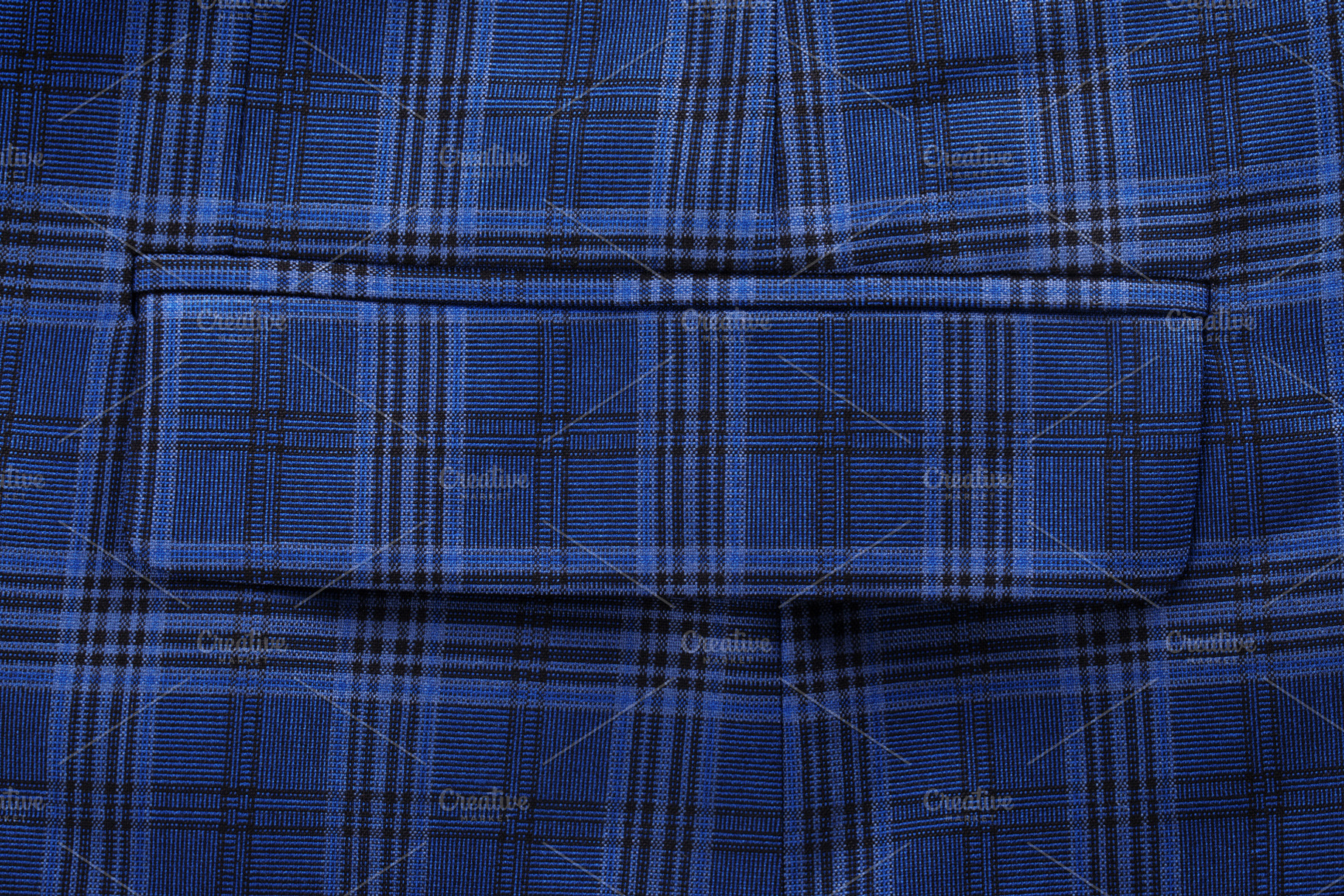 Detailed closeup of blue plaid patterned fabric with pocket, ide, a Background Photo by Ales Munt