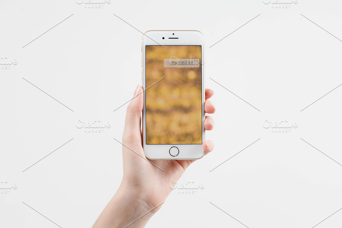 Female hand holding Iphone, an iPhone Mockup by Andriy Photography