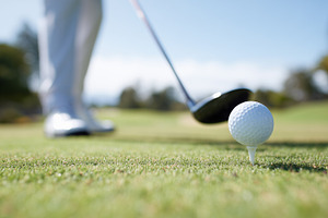 Close up of a golf ball on a tee as, a Sports & Recreation Photo by MistyDay