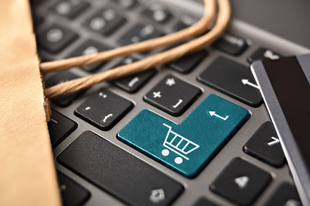 Internet shopping concept with keyboard with cart drawn on key, a Technology Photo by Davizro's Market