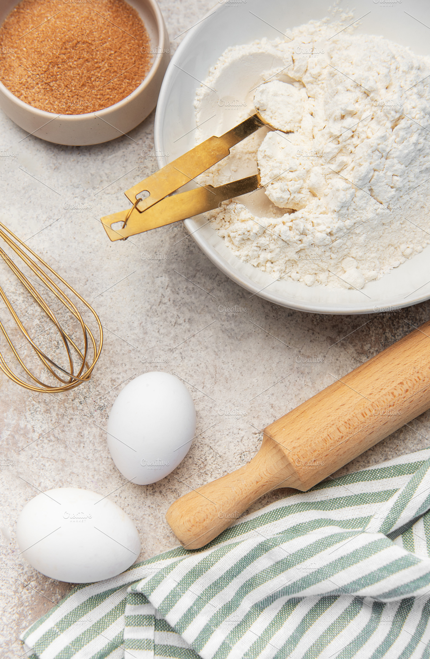 Baking ingredients preparing dough on kitchen counter, a Food & Drink Photo by Olena Rudo