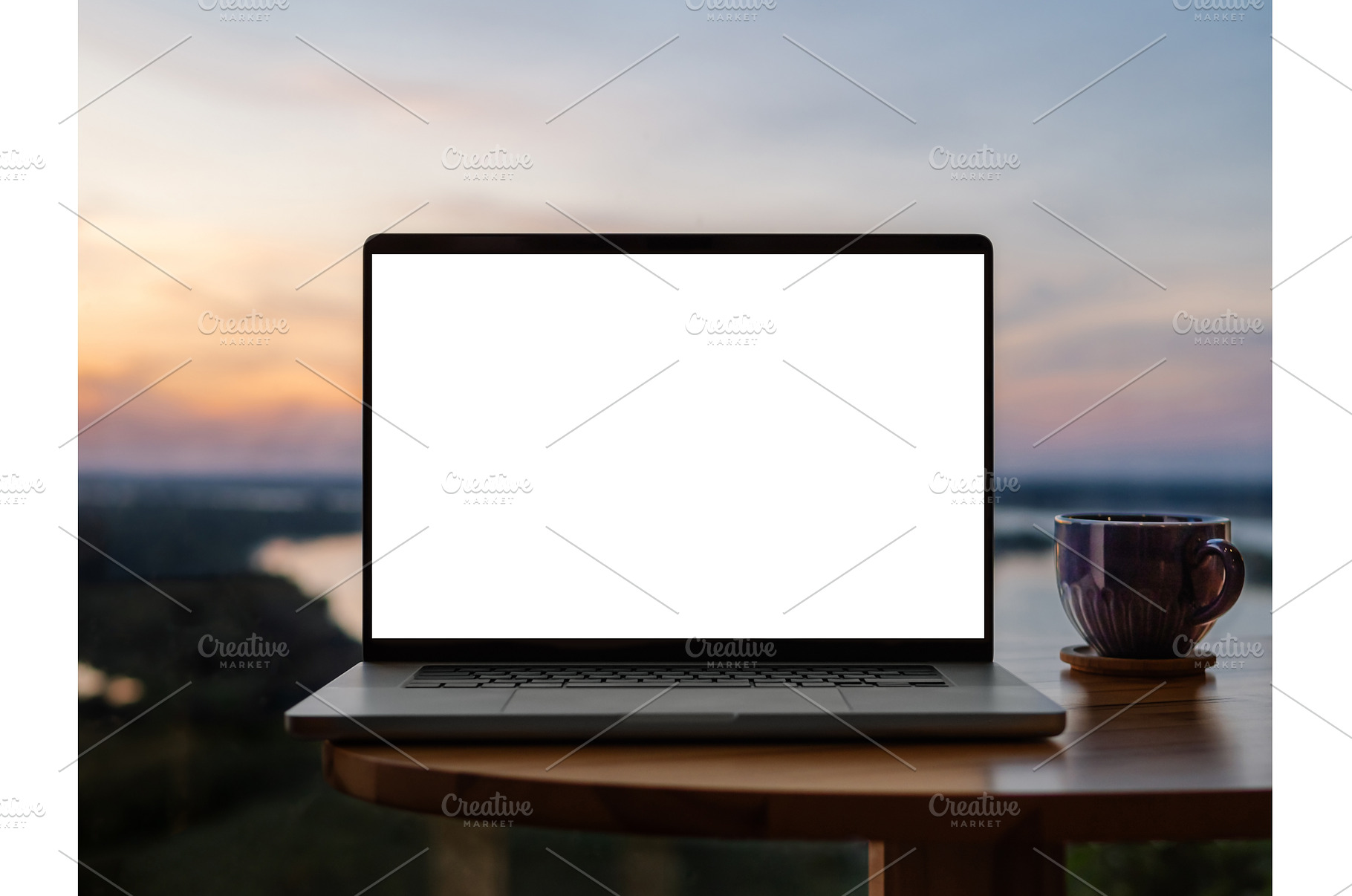 Laptop blank screen mockup at sunset, a Technology Photo by Fascinadora