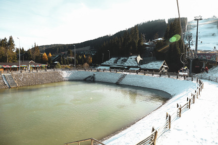 Lake in ski resort in Carpathian mountains, a Nature Photo by AtlasStudio PRO