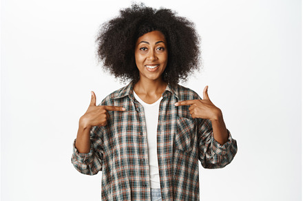 Smiling african american female, a Person Photo by Cookie Studio