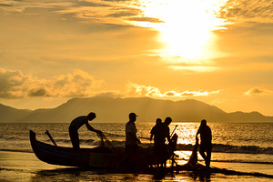 Fishermen Pulling Nets As the SunSet, a Nature Photo by bastera