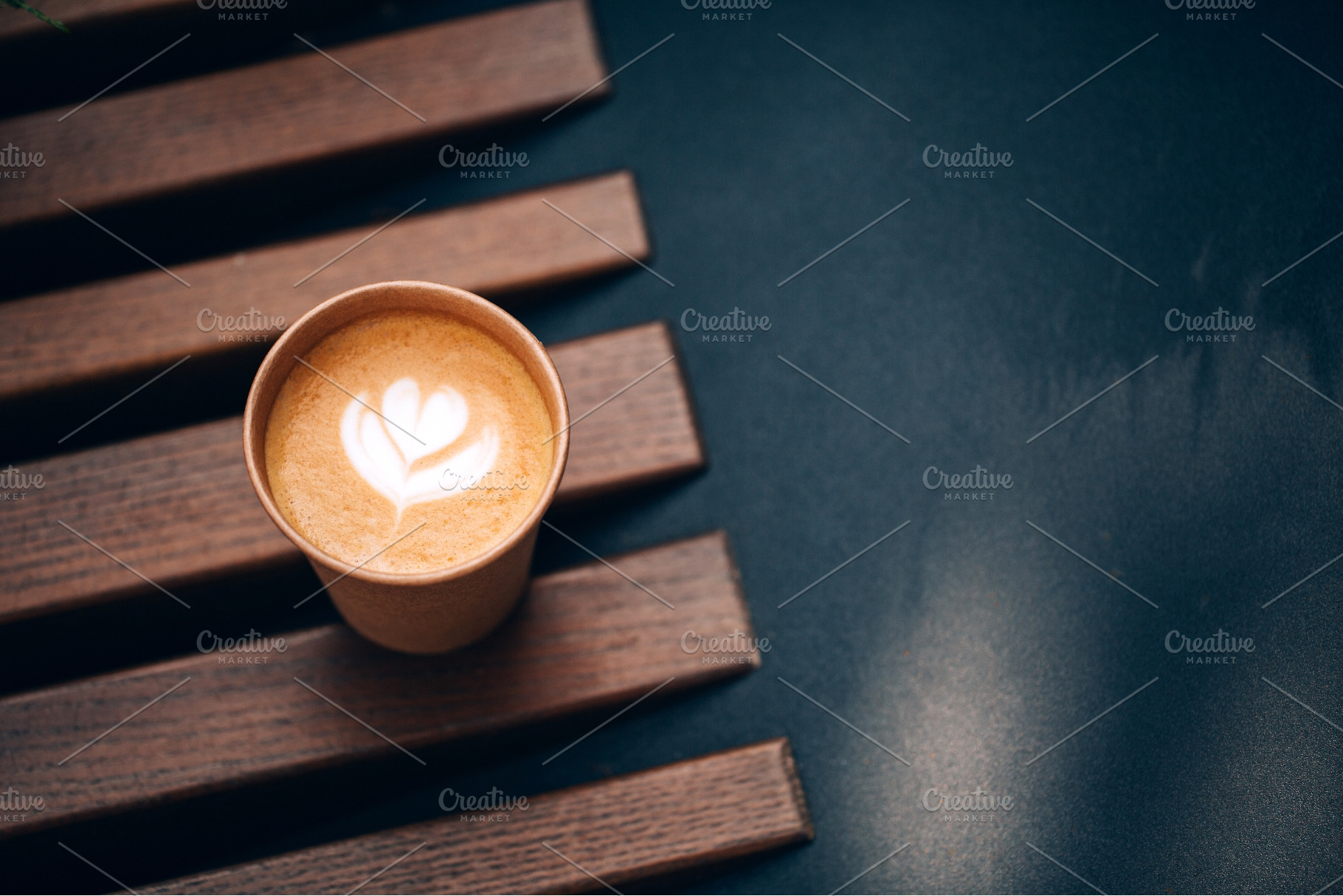 Takeaway coffee with heart latte art, a Food & Drink Photo by Anna Efetova