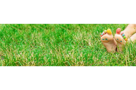 Children's feet with a pattern of, a Nature Photo by yanadjana