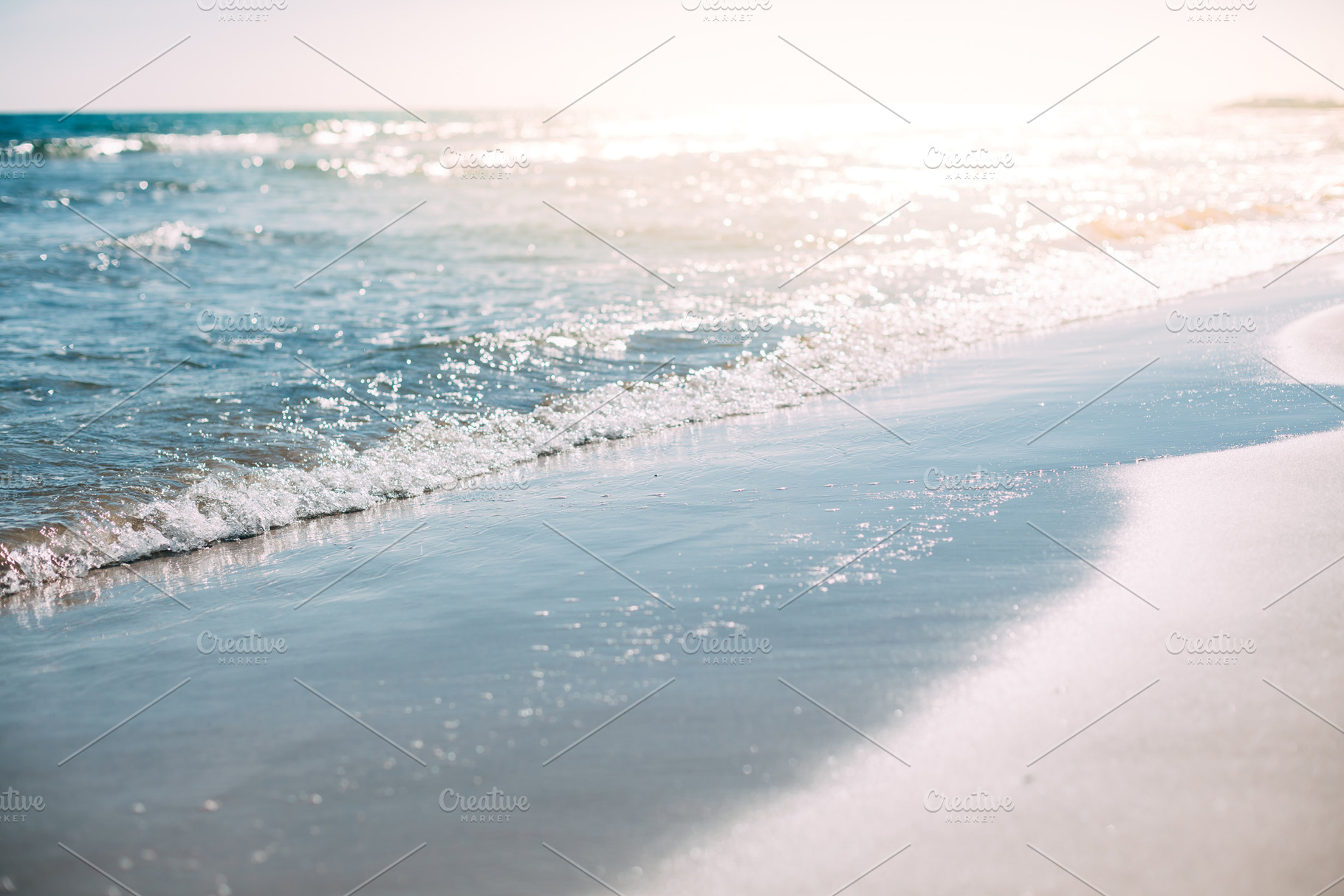 Summer sand beach and seashore waves containing beach, sea, and background, a Nature Photo by Dvoevnore photos