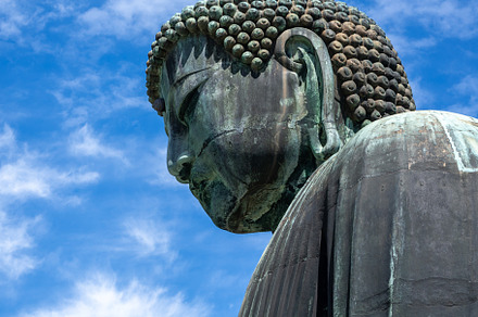 Great Buddha statue close-up view at Kotoku-in temple in Kamakur, an Architecture Photo by GoodGoods