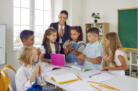 Happy multiethnic children with, a School & Education Photo by StudioRomantic
