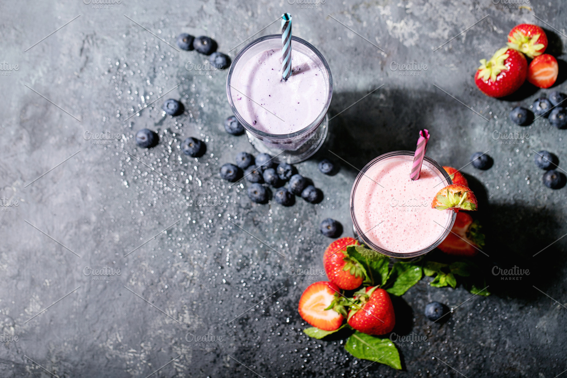 Fresh strawberry and blueberry milks featuring strawberry, milk, and juice, a Food & Drink Photo by RomanDebree
