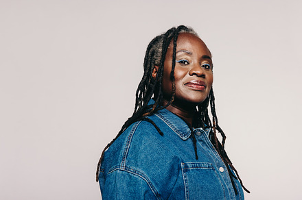 Fashionable mature woman with dreadlocks looking at the camera, a Person Photo by Jacob Lund