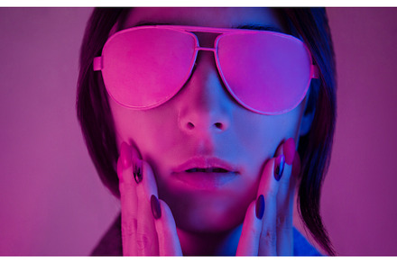 Portrait of a young woman in neon, a Person Photo by P&G
