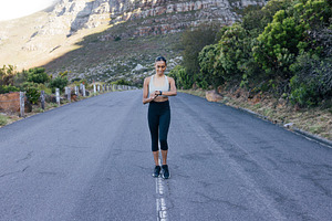 Full length of a smiling female walk, a Sports & Recreation Photo by Artem Varnitsin