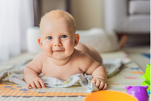 Little baby playing with toys on a, a School & Education Photo by Elizaveta Galitskaya