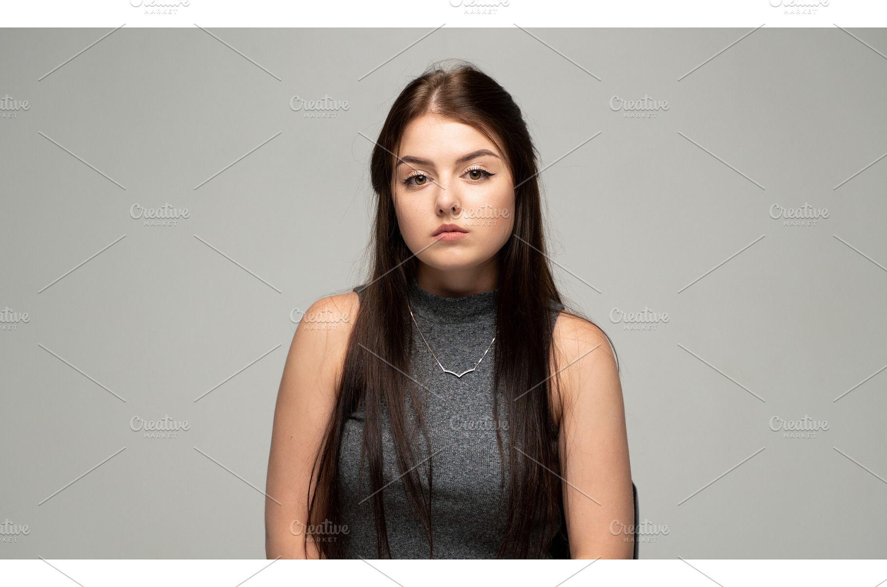 Young brunette woman looking at the, a Person Photo by volodymyrshtun13795
