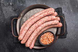 Close up of uncooked raw sausage showcasing its juicy texture, i, a Food & Drink Photo by composter-box@mail.ru