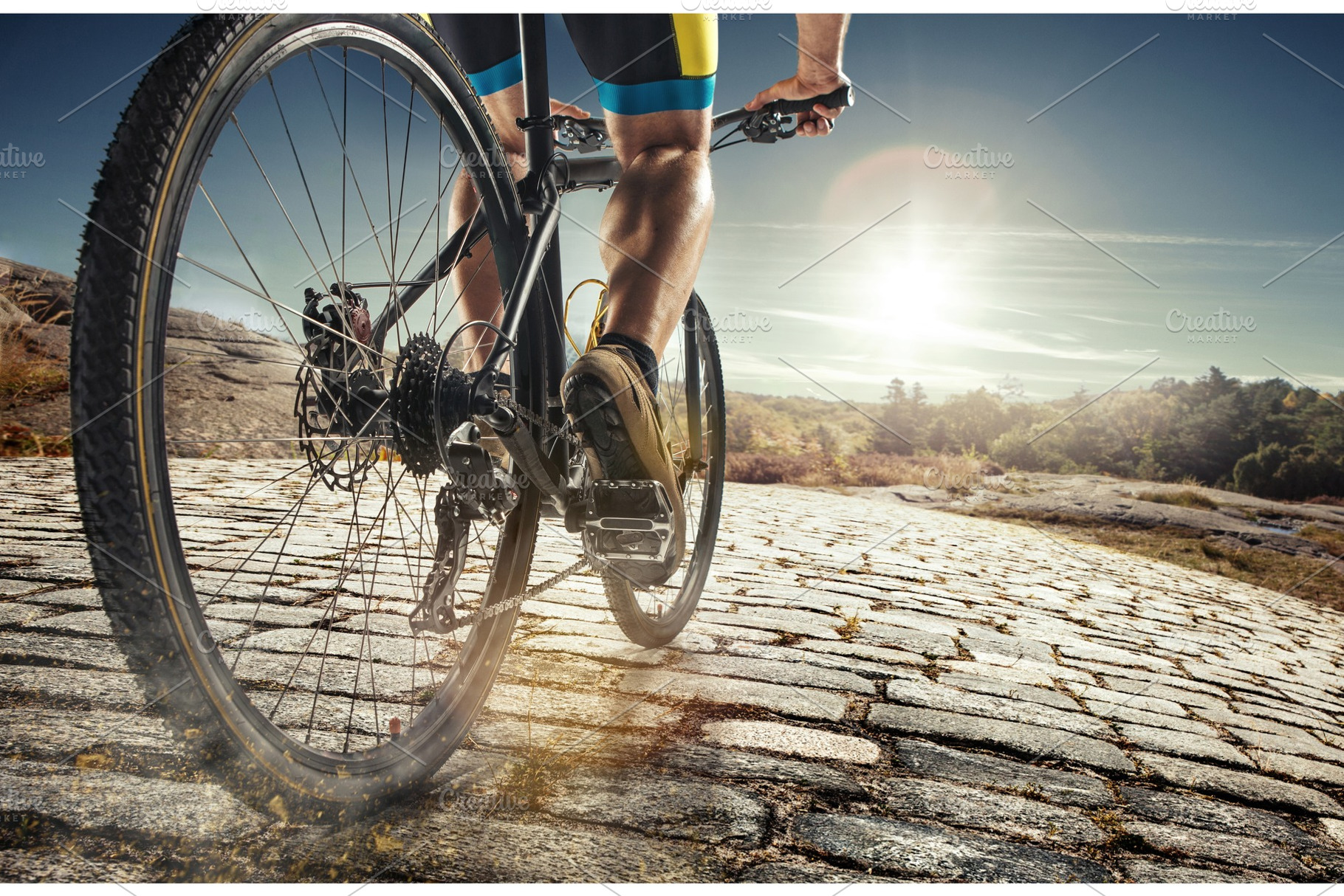 Detail of cyclist man feet riding mountain bike on outdoor trail on country, a Sports & Recreation Photo by Volodymyr Melnyk