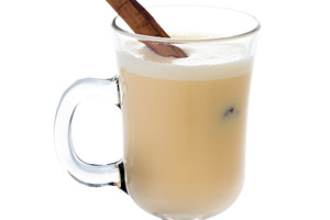 Glass of eggnog with cinnamon sticks, a Food & Drink Photo by etorres69