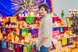 Man visiting a colorful Day of the