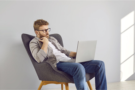 Young programmer is sitting in, a Person Photo by StudioRomantic