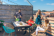 Friends talking and drinking at a party on a terrace, a Person Photo by davidpereiras (Thumbnail 1 of 2)