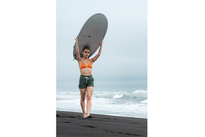 Millennials female surfer of, a Sports & Recreation Photo by Alexander-Piragis