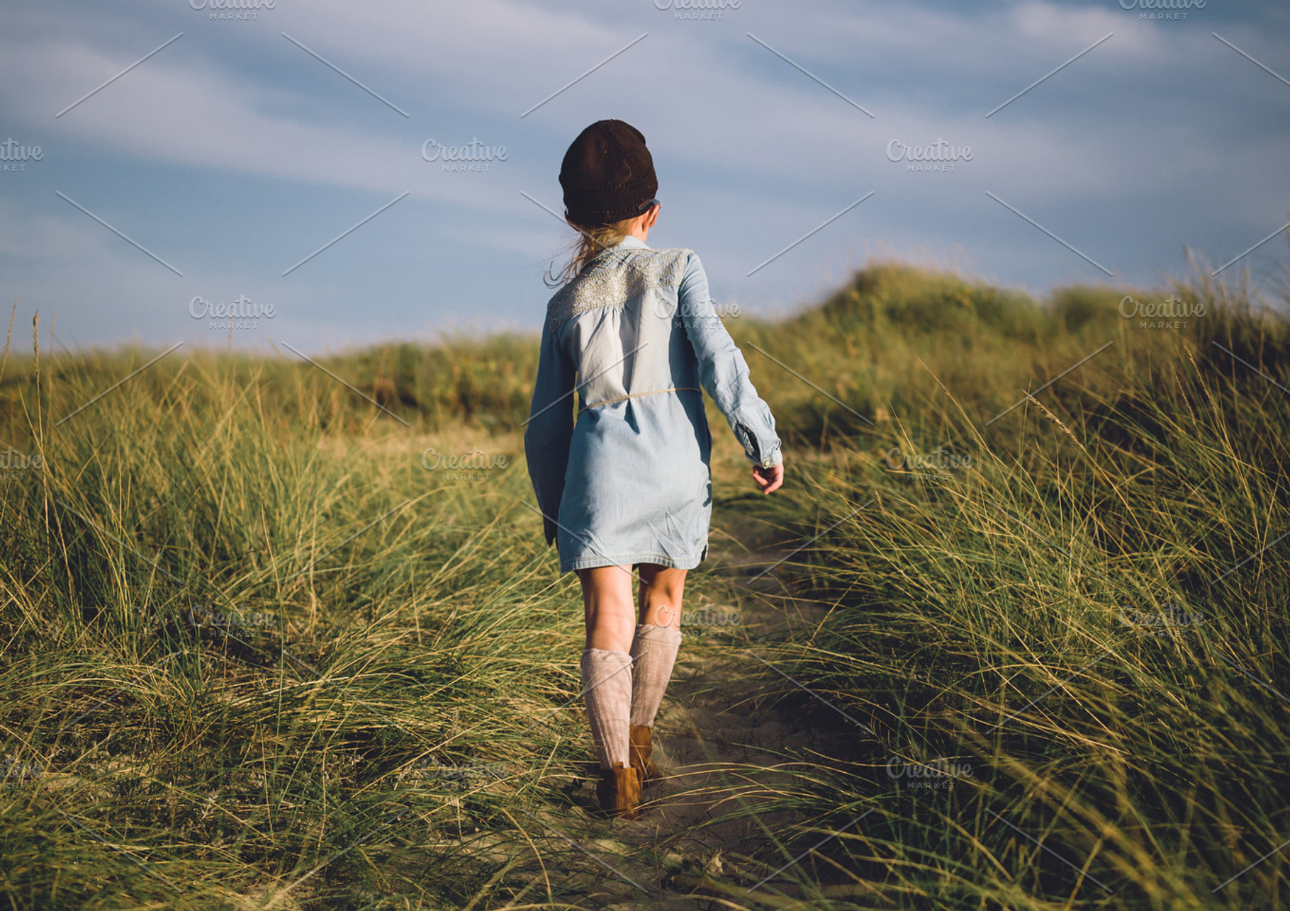 Young girl walking on a trail stock photo containing girl and walking, a Person Photo by Photoweb00