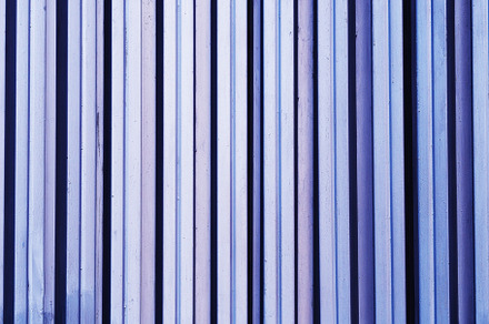 Vertical metallic fence surface texture backdrop