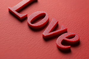 Love lettering word in red color creating passion and romance fo, a Photo by Studio ANNA