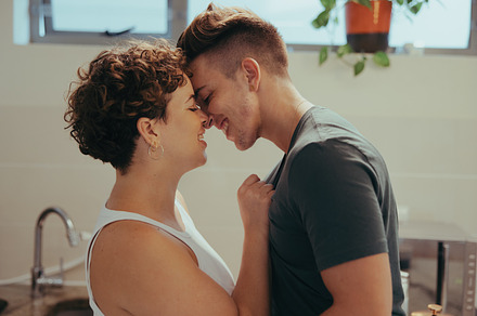 Affectionate queer couple being romantic at home, a Person Photo by Jacob Lund