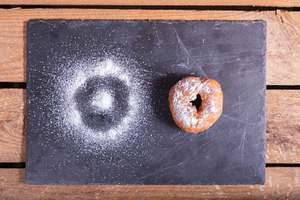 Donut containing glazed, sugar, and desert