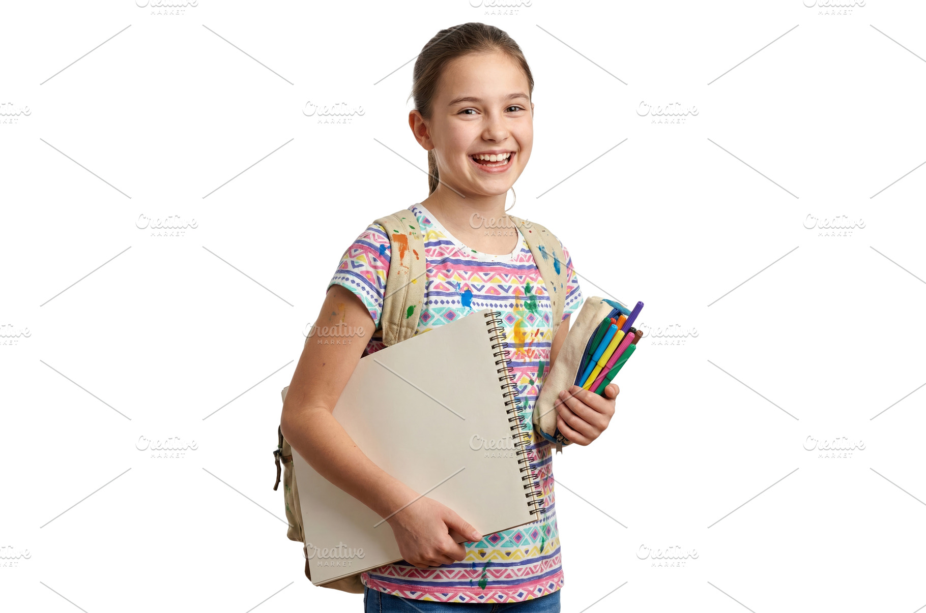 Girl Holding School Supplies, a School & Education Photo by CREATIVEDEF