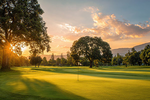 Majestic golf course at sunset showc, a Photo by Pavel_design
