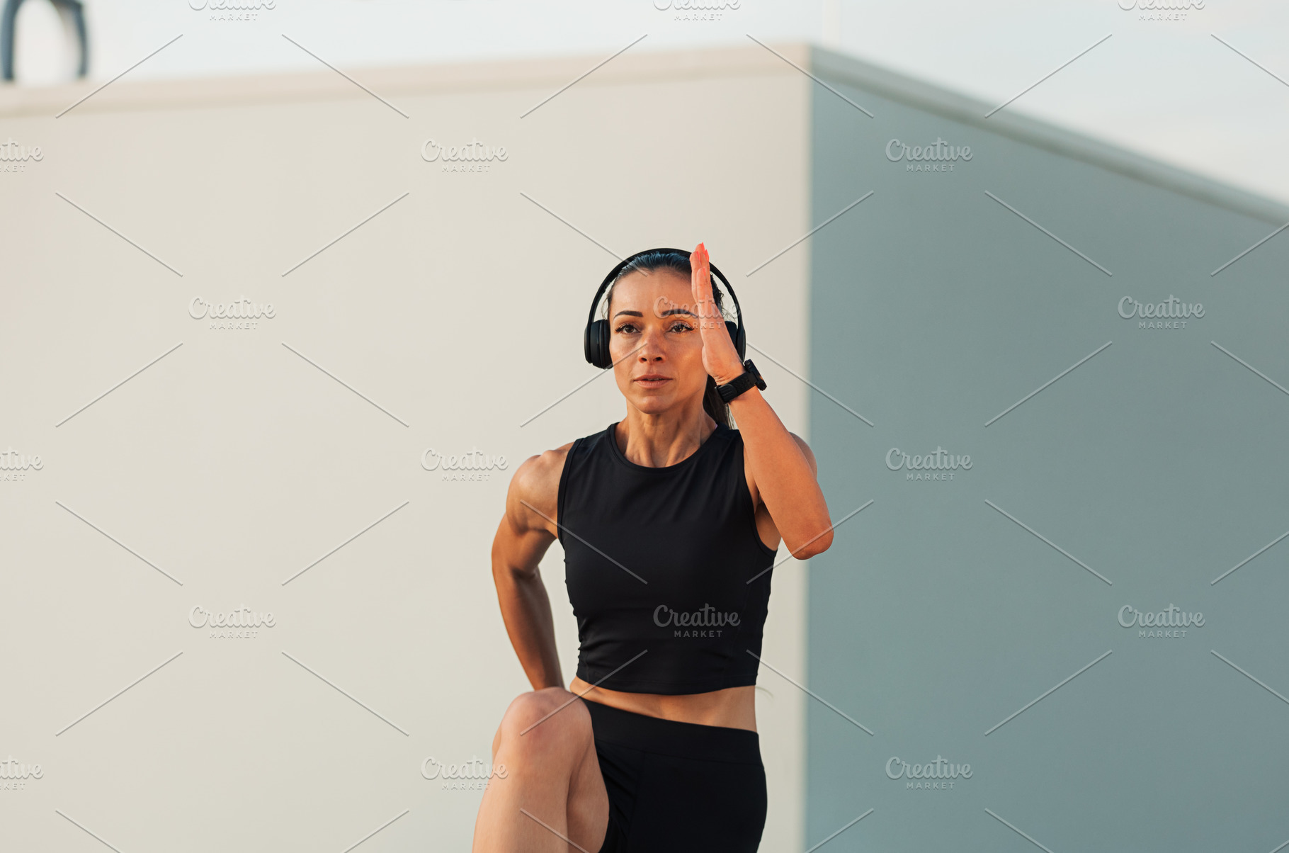 Young slim woman wearing headphones, a Sports & Recreation Photo by Artem Varnitsin