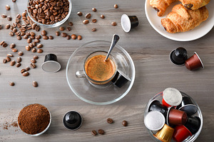 Breakfast with a cup of espresso on wooden table top, a Food & Drink Photo by Davizro's Market