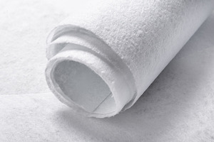 White Geotextile Fabric Sheets with Visible Texture, Close-Up, an Industrial Photo by MDBildes