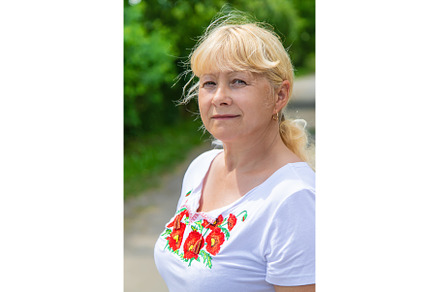 A Ukrainian woman in an embroidered, a Person Photo by yanadjana