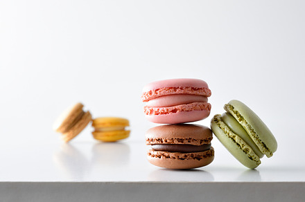 French macaroons on white table and isolated background, a Food & Drink Photo by Davizro's Market