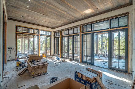Workers installing windows and doors, a Photo by Pavel_design