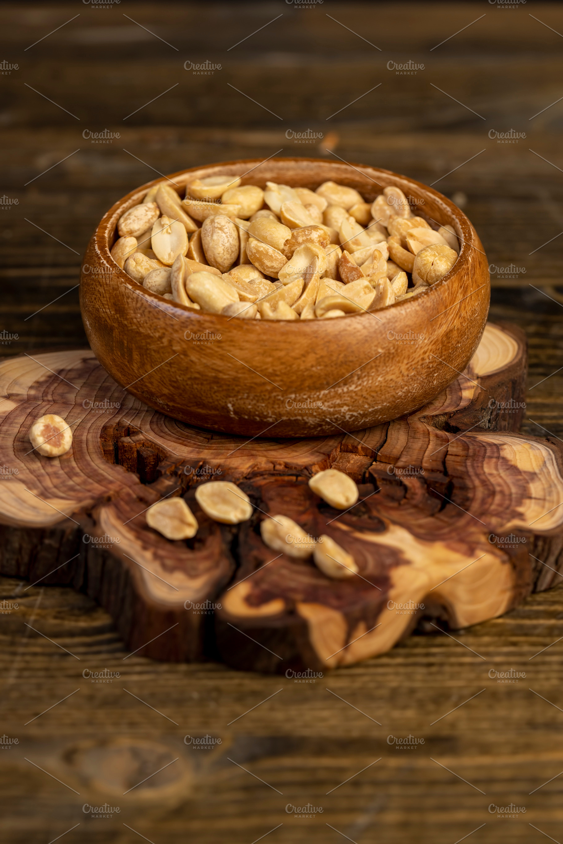 fried yellow peanuts with a little salt on the table, a Photo by rsoollAI