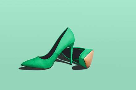 Green pastel high heels isolated on 