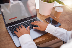 Laptop screen, typing and hands with website design mockup, market research and information planning. Professional woman working or copywriting on computer for digital career and homepage update, a Photo by Peopleimages.com