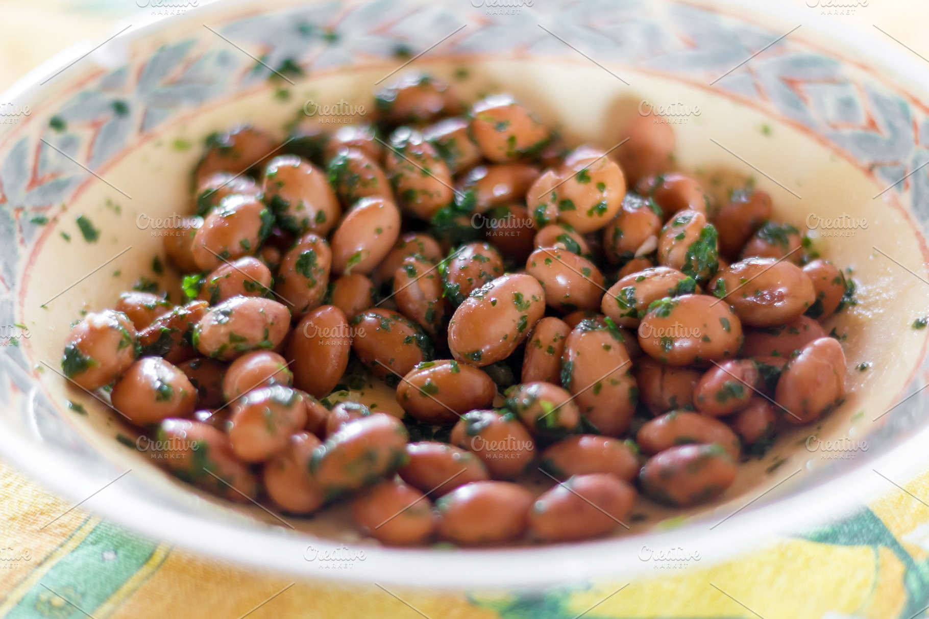 Red beans boiled in a plate, a Food & Drink Photo by KYNA STUDIO