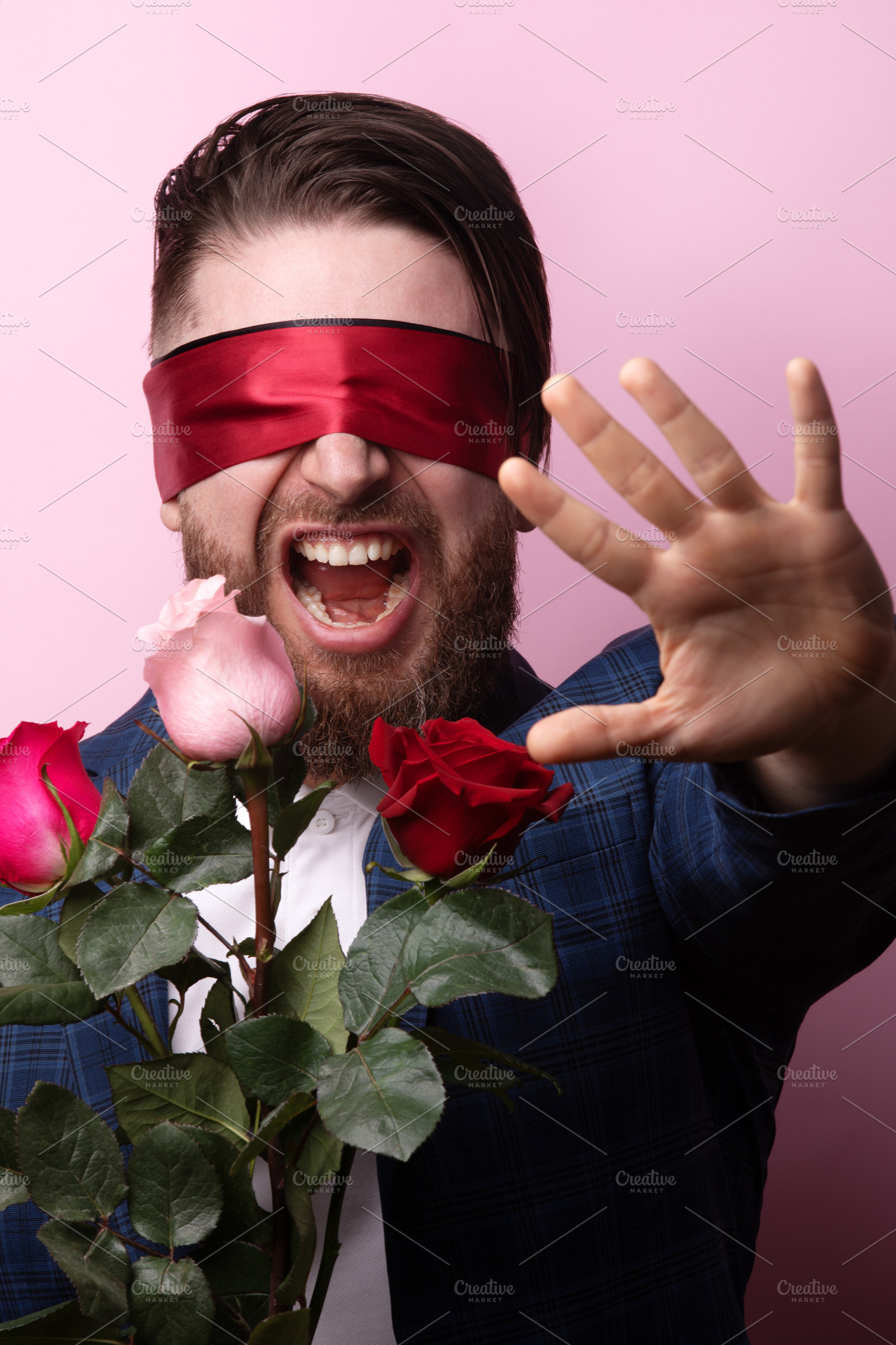 Blindfolded Man With Roses, a Person Photo by Ales Munt