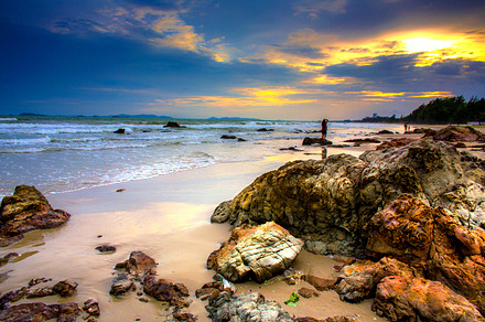 Sunset at the sea stock photo containing sunset and beach
