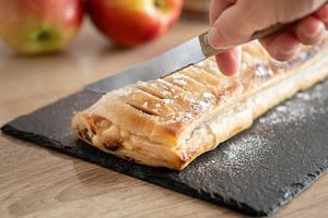 Cutting homemade apple strudel, a Food & Drink Photo by etorres69