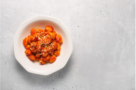 Traditional gnocchi with tomato, a Food & Drink Photo by zakiroff