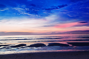 Sunset at the beach, a Photo by saiko3p